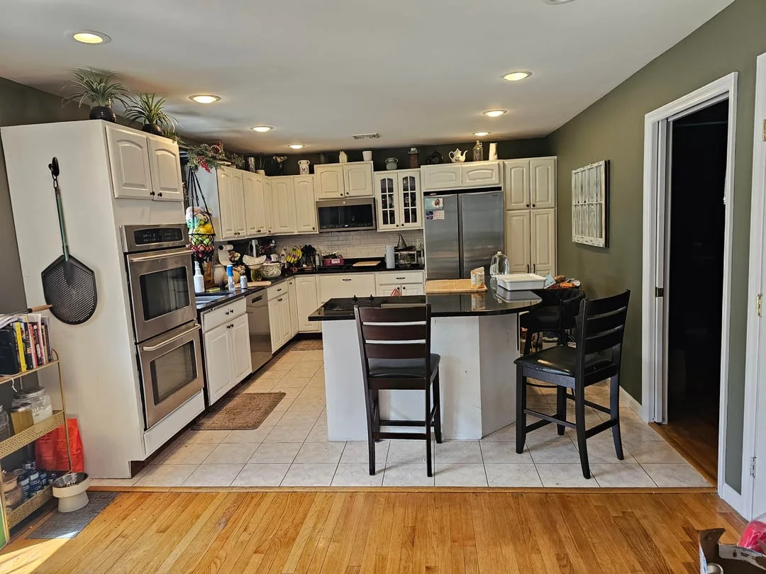 Original Reddit kitchen with an oversized angled island interrupting the room
